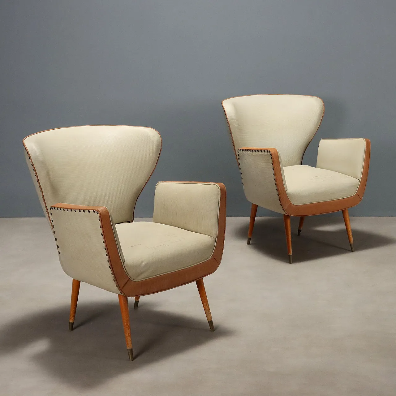 Pair of vinyl and wooden armchairs, 20th century 1