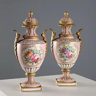Pair of pink and gold prongs with polychrome decoration, 20th century
