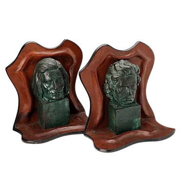 Pair of leather bookends with bronze sculptures, 20th century