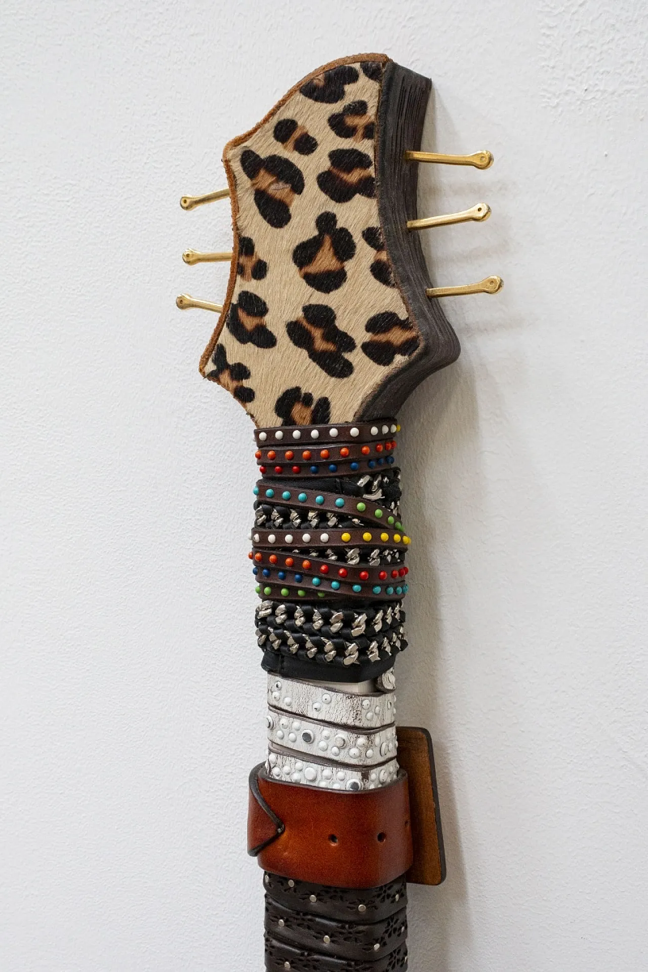 Leather-covered handcrafted guitar, 20th century 6