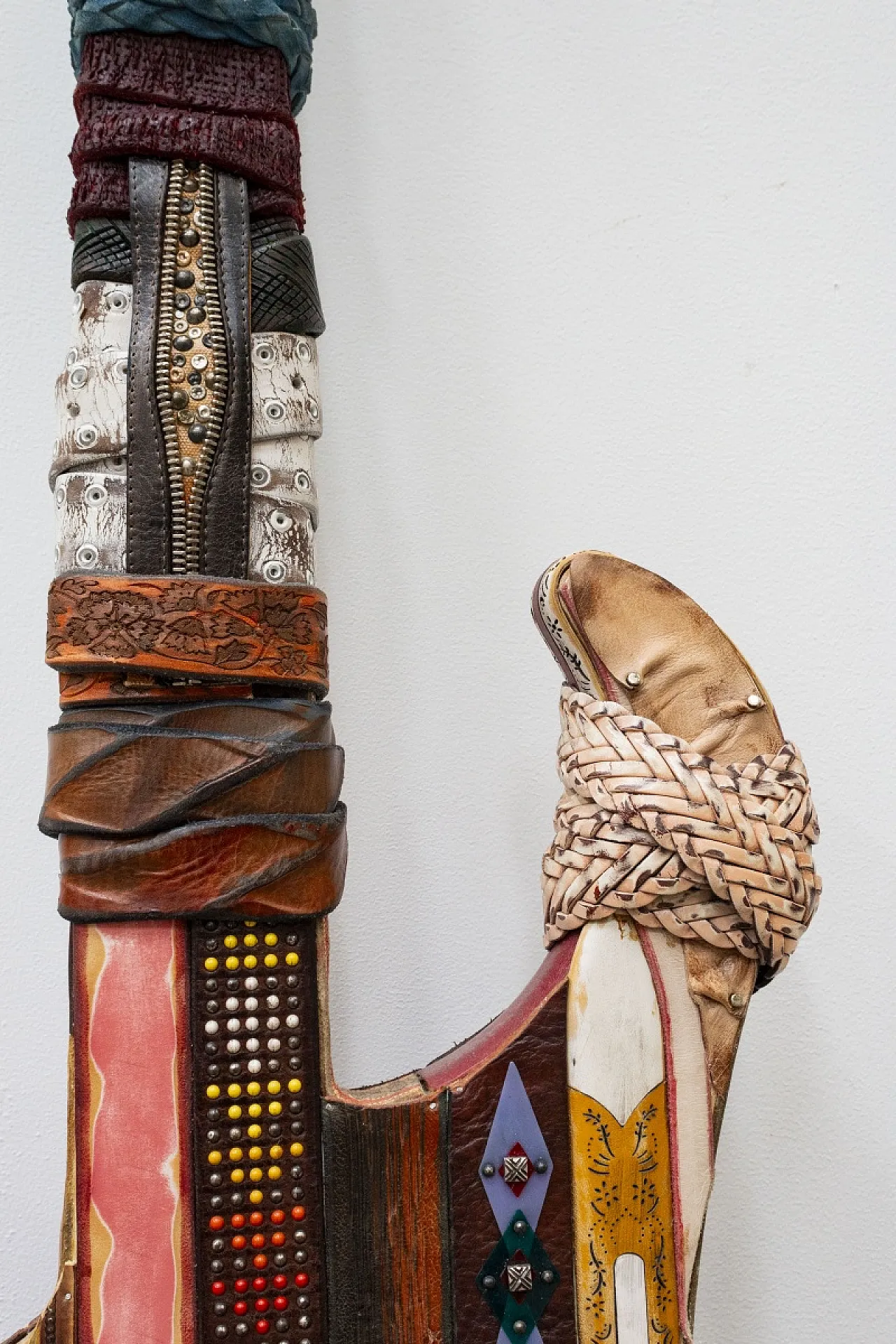 Leather-covered handcrafted guitar, 20th century 11