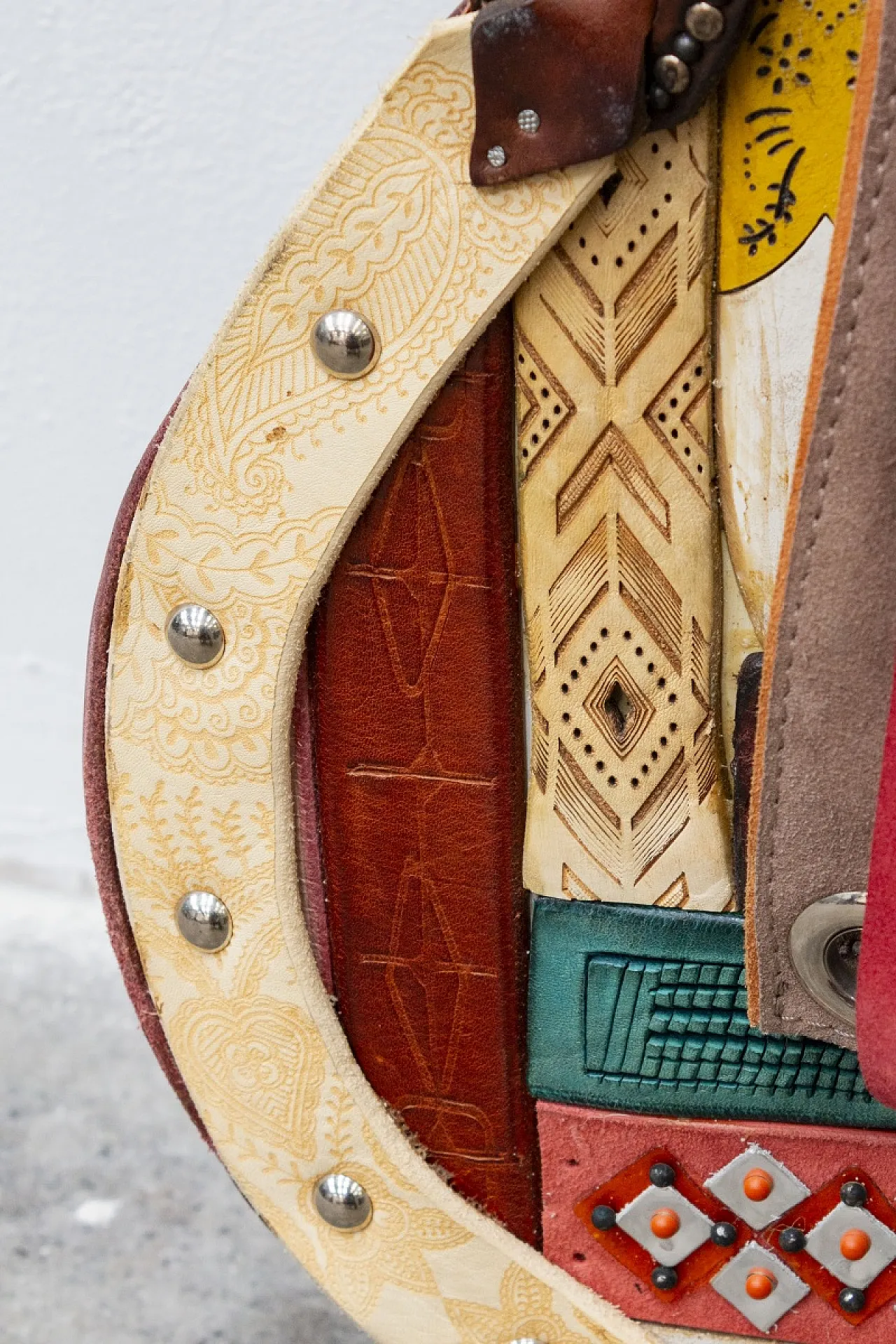Leather-covered handcrafted guitar, 20th century 12