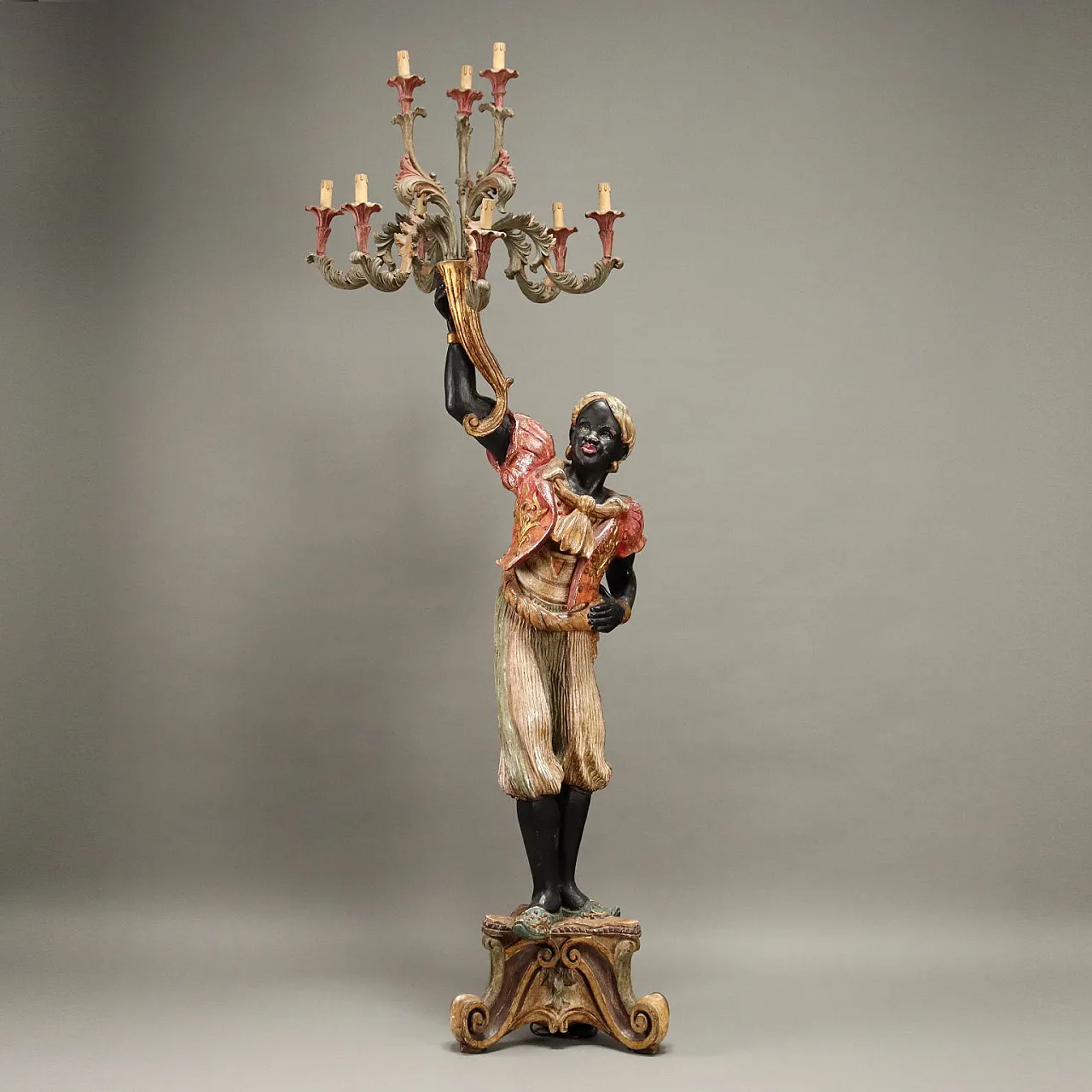 Carved wood and iron candelabra, 20th century 1