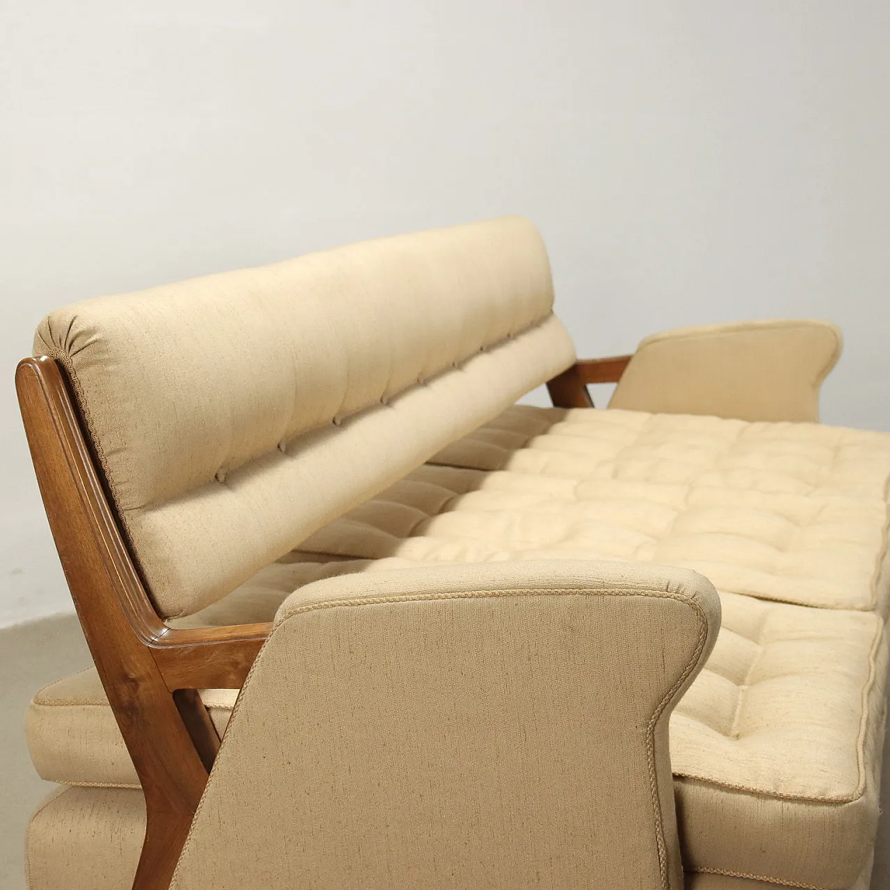 Three-seater sofa with wooden frame and upholstery in capitonné fabric, 1960s 3