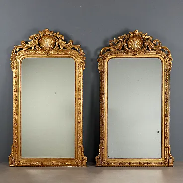 Pair of carved and gilded wooden floor mirrors, mid-19th century