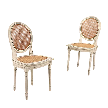 Coppia di sedie in legno laccato e paglia di Vienna, '900