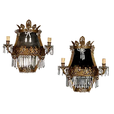 Pair of gilded bronze sconces with neoclassical motifs, 19th century