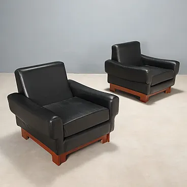 Pair of wooden armchairs and leather upholstery, 20th century