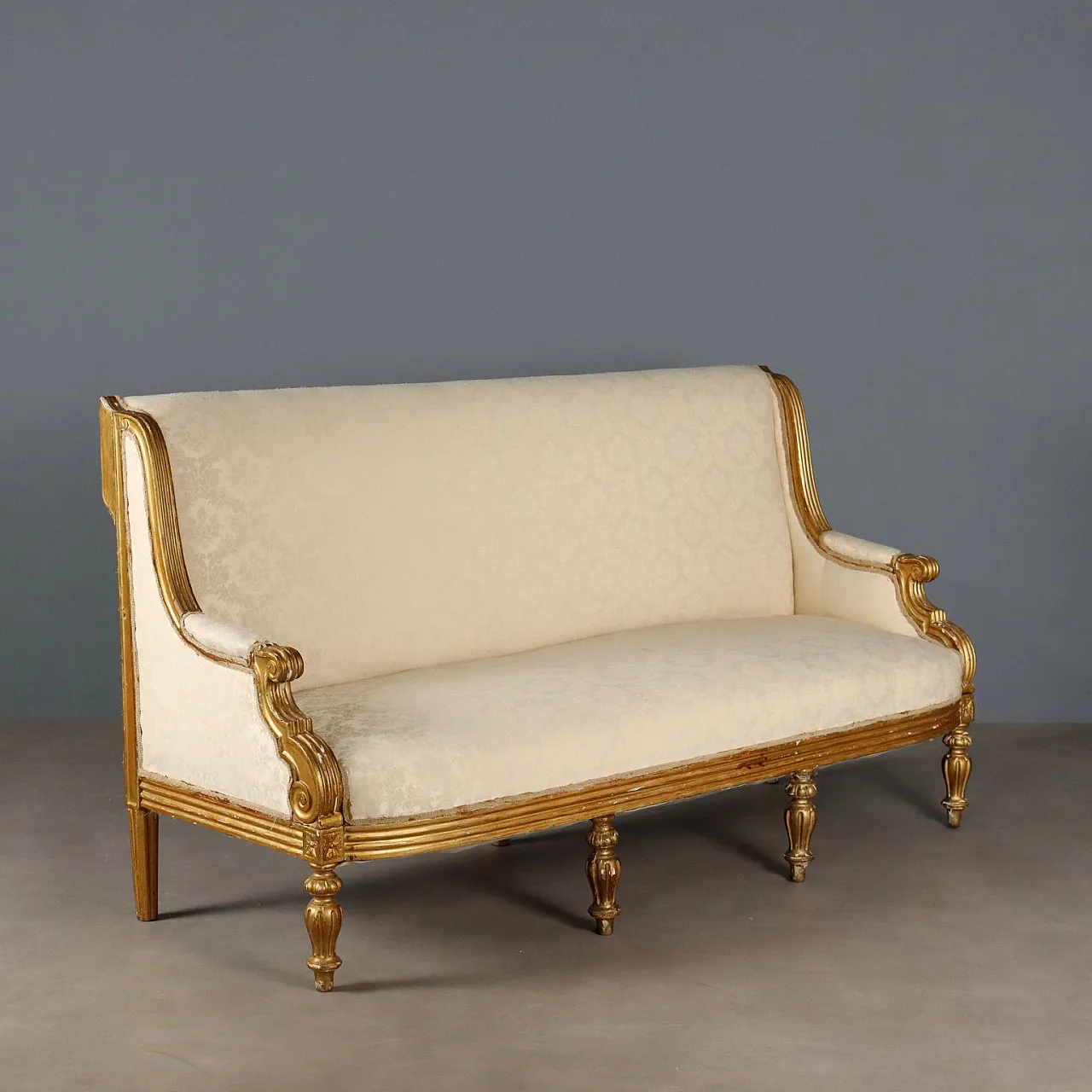 Neoclassical style sofa in carved and gilded wood, 19th century 1