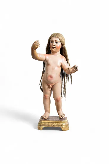 Scultura in legno policromo raffigurante bambino benedicente, '700