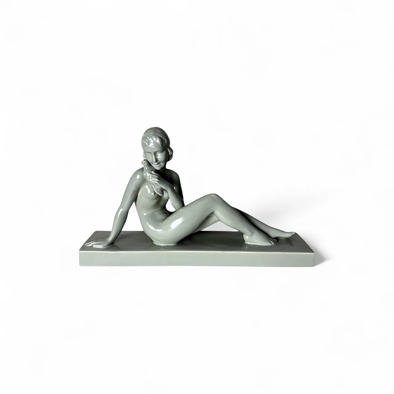Art Deco ceramic figure of a young woman, mid-20th century 20