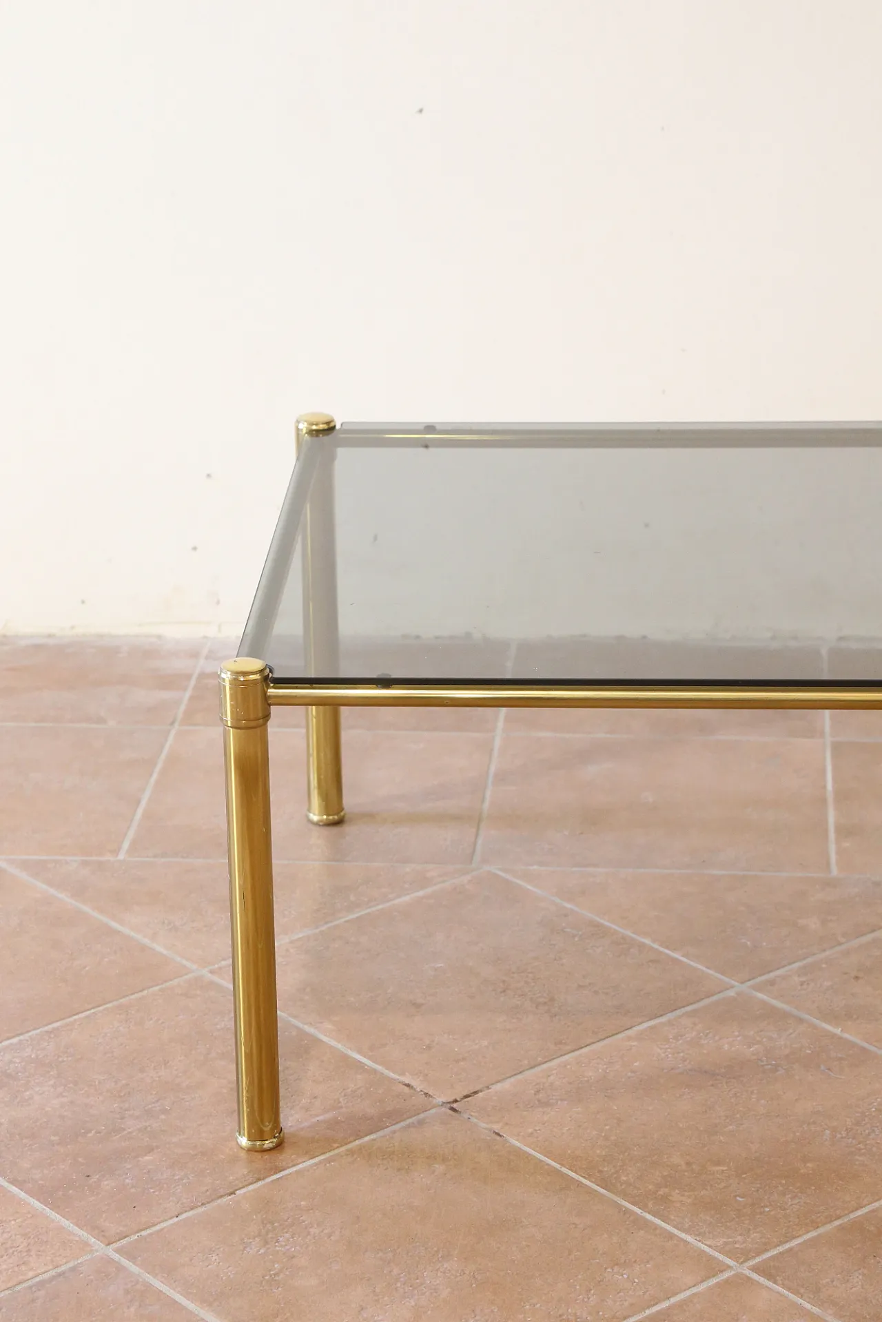 Coffee table in golden brass and glass, 70s 1