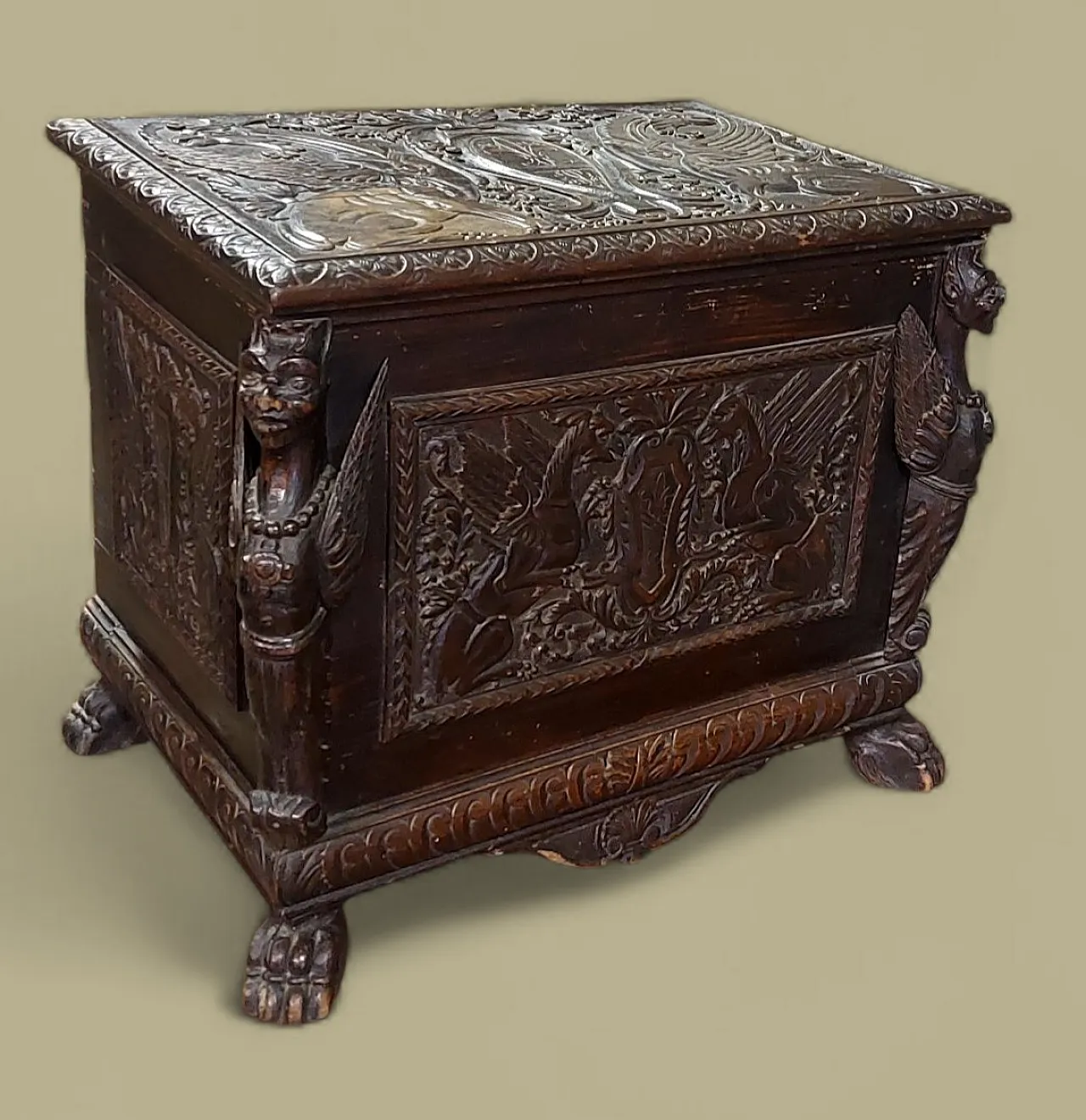 Carved wooden case with coats of arms and winged griffins,19th century 1