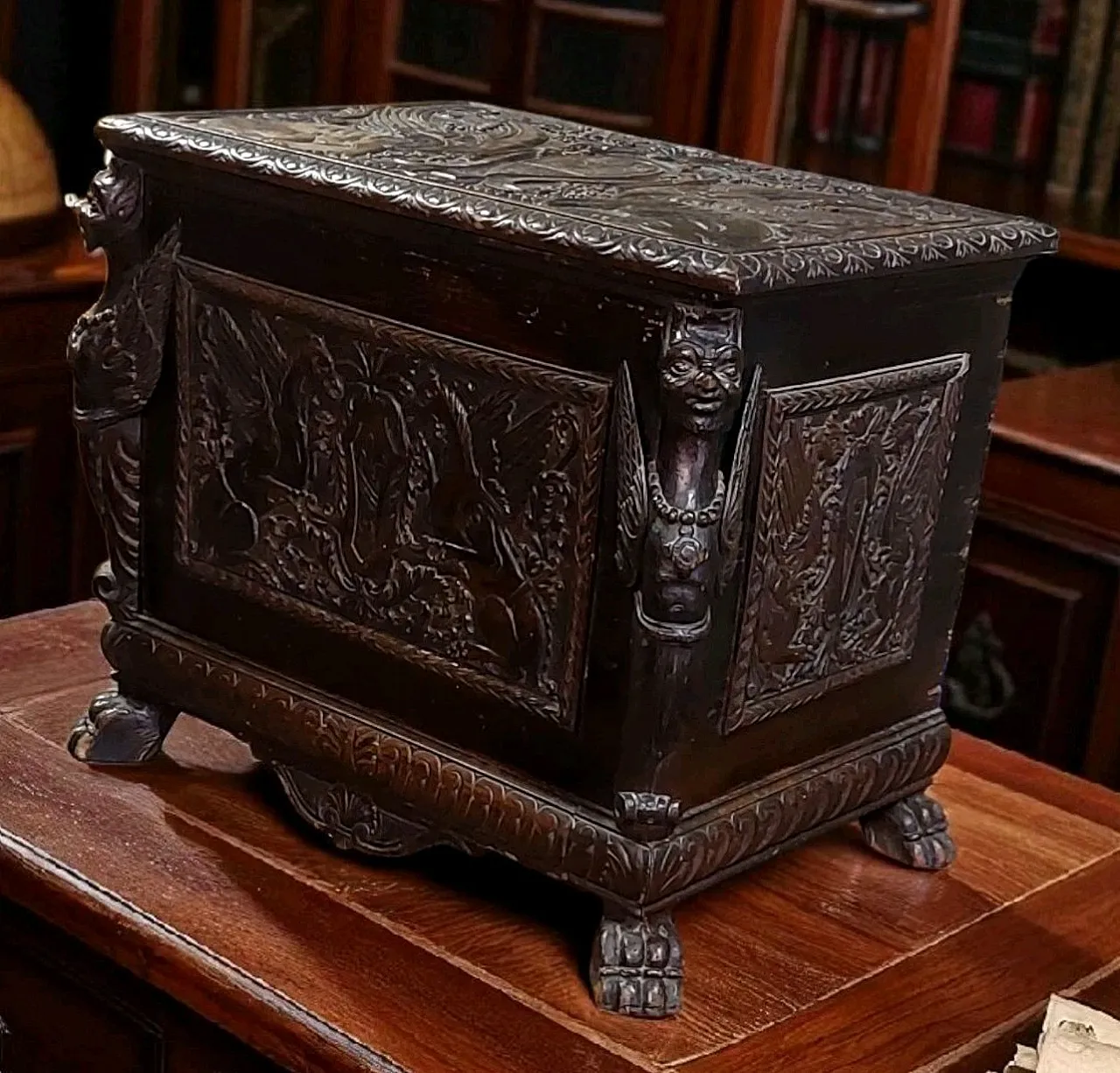 Carved wooden case with coats of arms and winged griffins,19th century 2