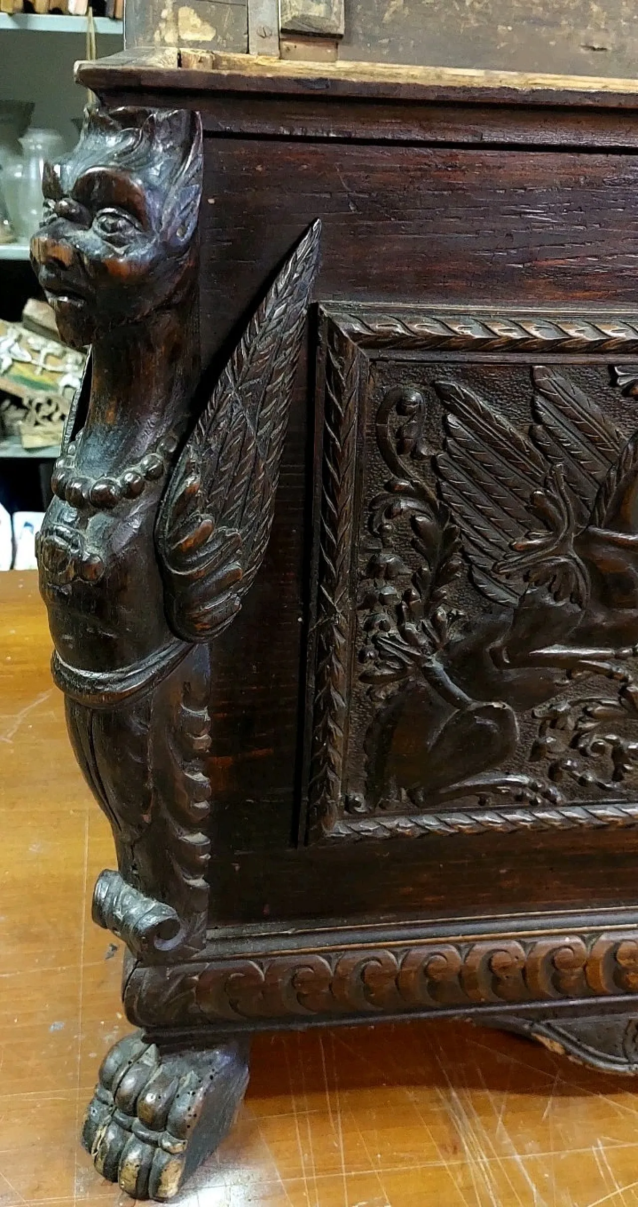 Carved wooden case with coats of arms and winged griffins,19th century 3