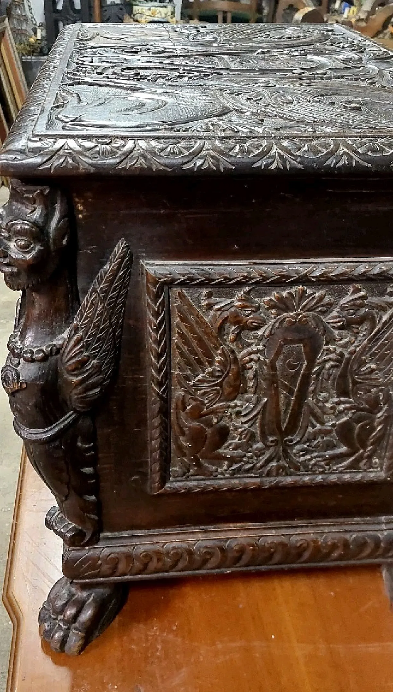 Carved wooden case with coats of arms and winged griffins,19th century 9