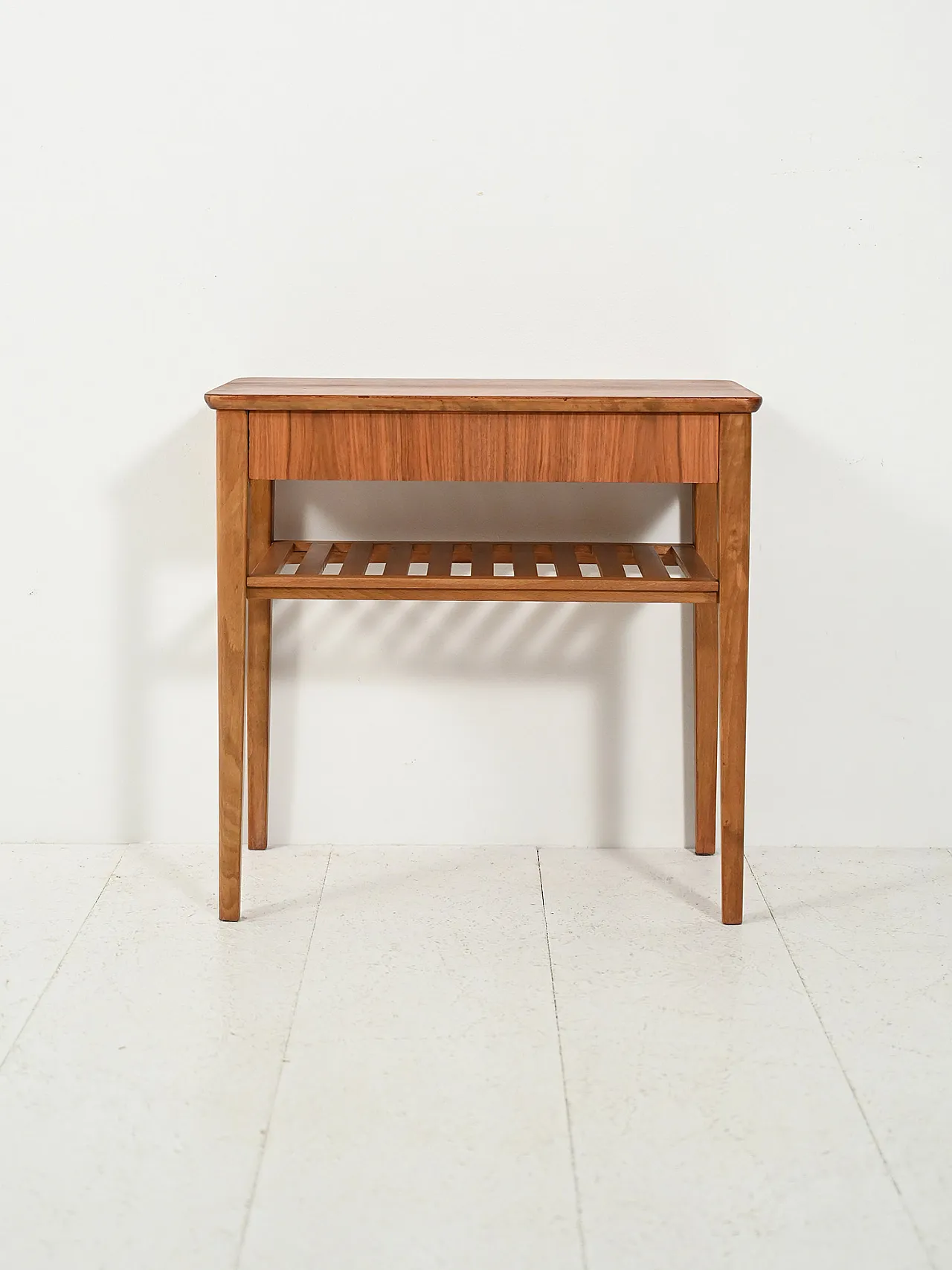 Scandinavian bedside table with slatted magazine rack 2