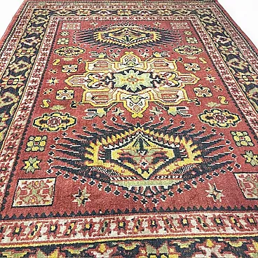 Tappeto lana fondo rosso motivi geometrici, anni '70