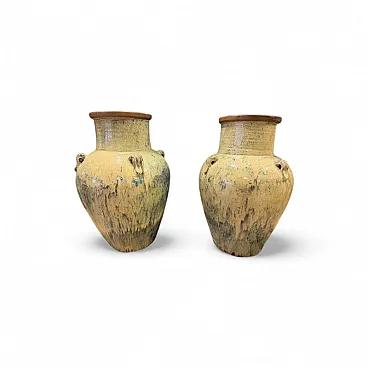 Pair of glazed terracotta orcs, 20th century