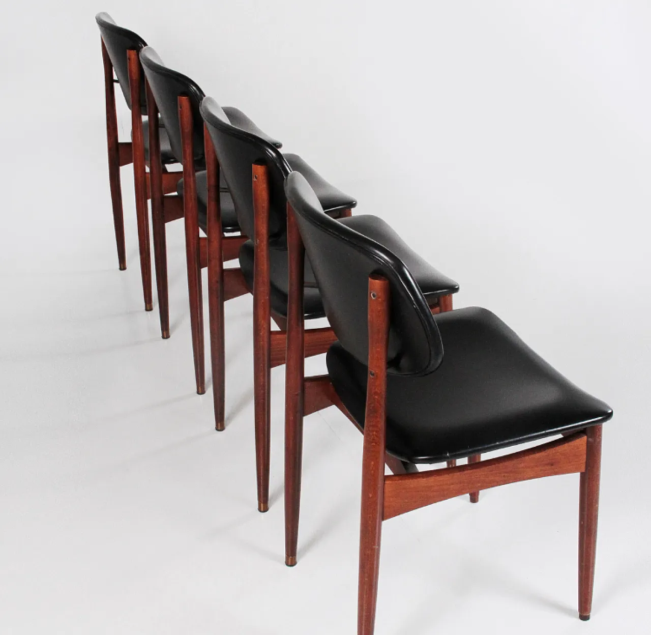 4 Wood and leather chairs, 1960s 5