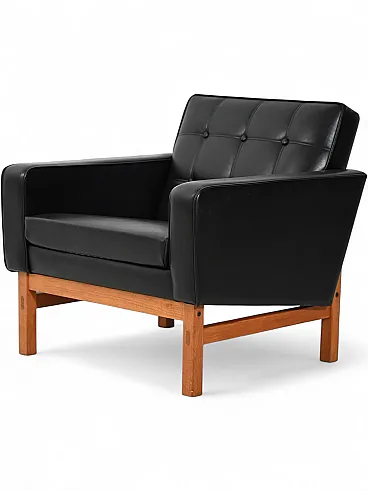 Poltrona svedese AB Futura in similpelle nera