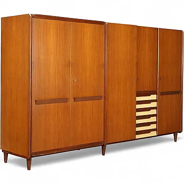 Armadio con ante battenti e cassetti impiallacciati in teak, '900