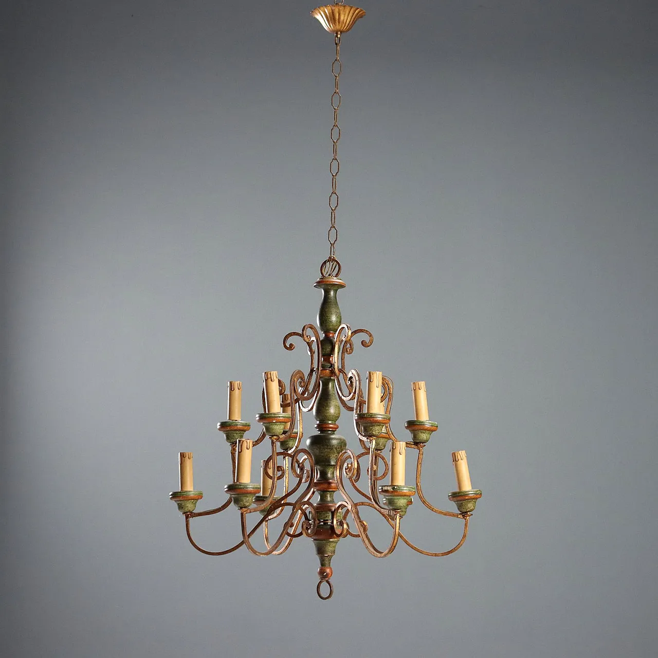 Twelve-light chandelier in curled and gilded iron, 20th century 1