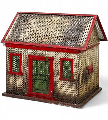 Perforated metal rabbit hutch, early 20th century