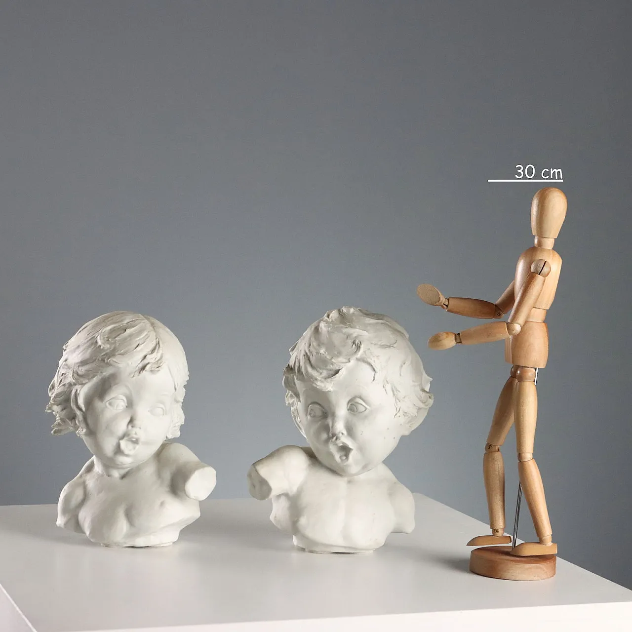 Coppia di busti di bambini, sculture in biscotto specchiato, '900 2