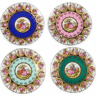 4 Decorated polychrome porcelain wall plates, 20th century