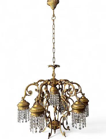 Chandelier in brass, bronze and crystal, 20th century