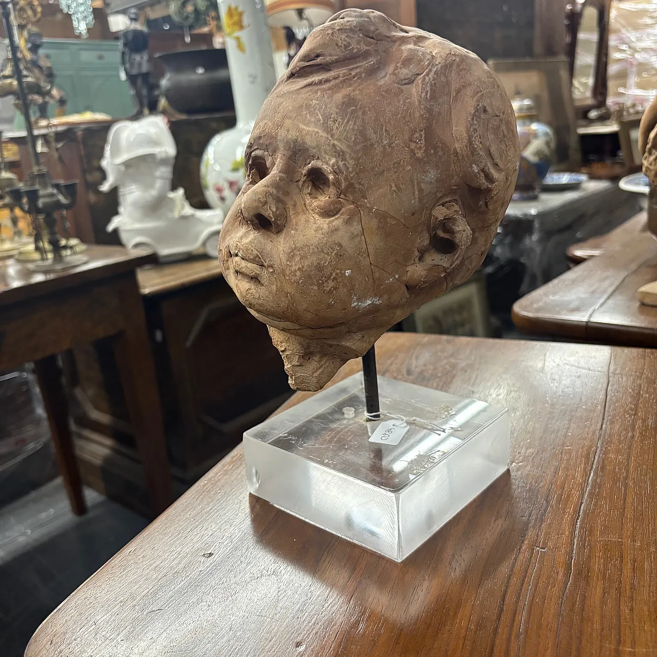 Ancient 19th century terracotta sculpture of the head of an Angel Putto. Size 3