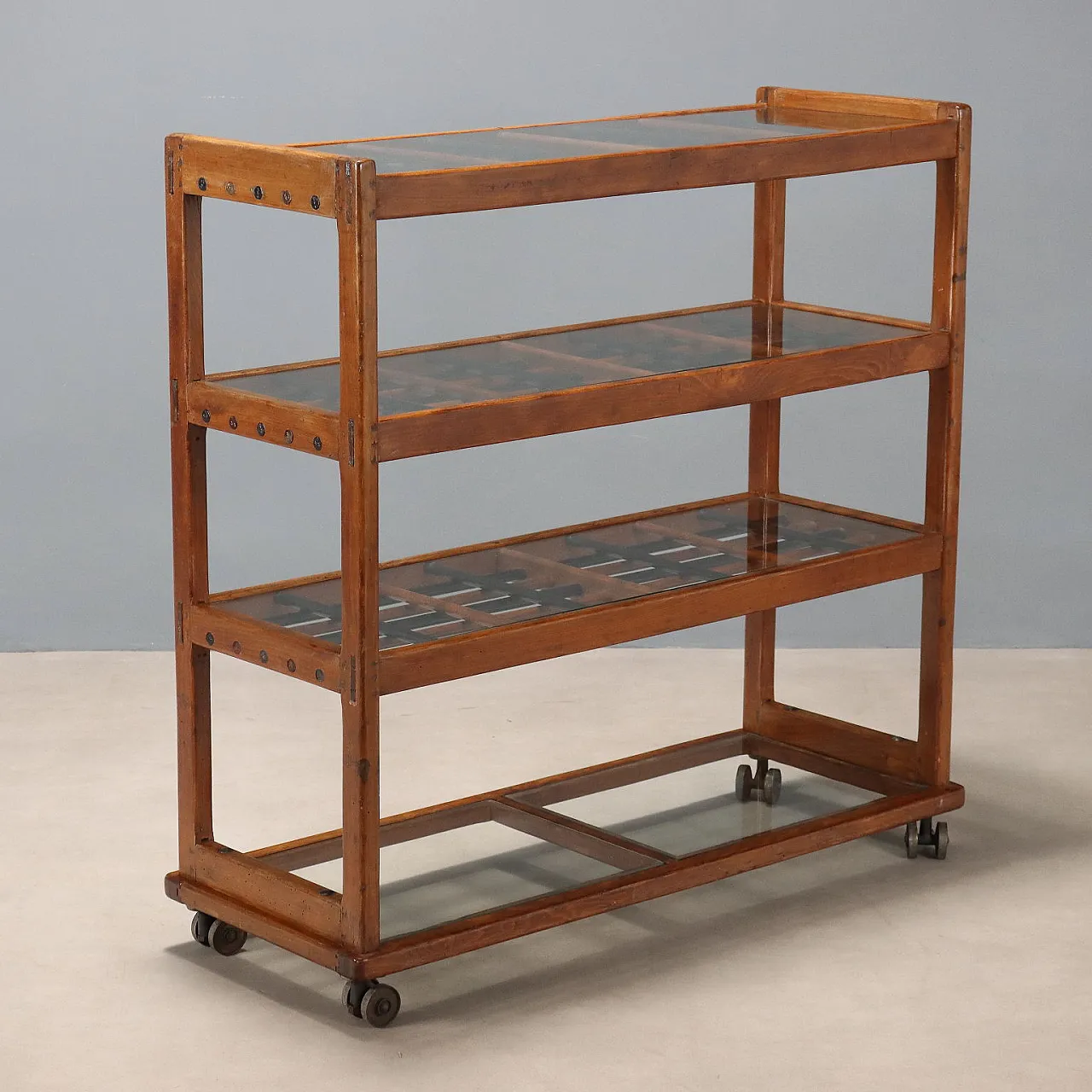 Central bookcase with beech wood wheels and glass, 20th century 1