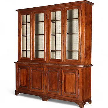 Bookcase in walnut-stained fir and glass, late 19th century