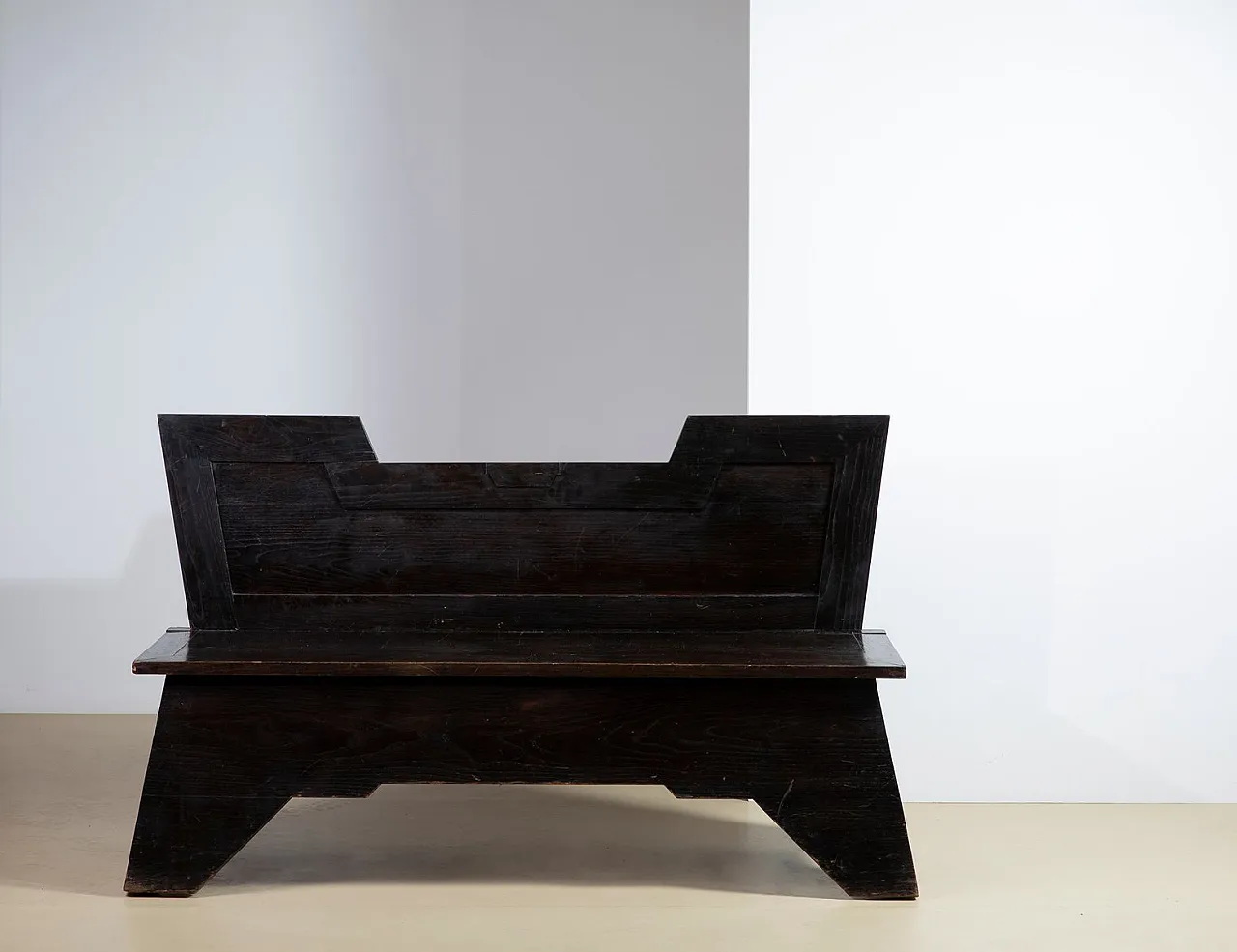 Art Deco sculptural bench in dark burnished wood, 1920s 1