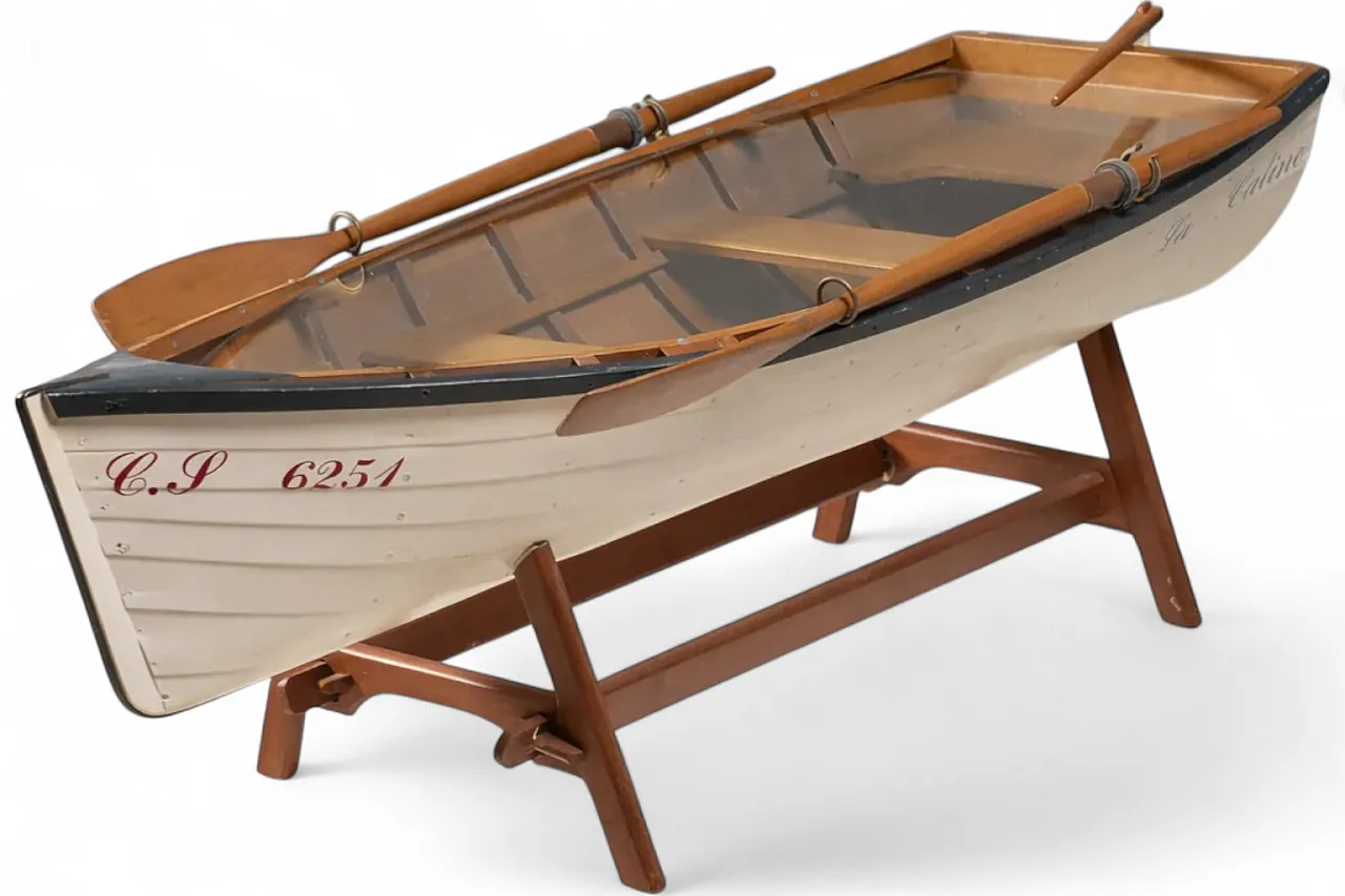 Reimagined boat-form coffee table with glass top, 2000s 9