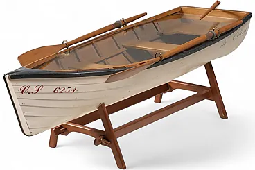 Reimagined boat-form coffee table with glass top, 2000s