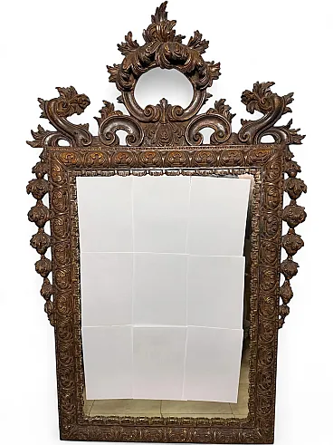 Carved and gilded wooden mirror, 18th century