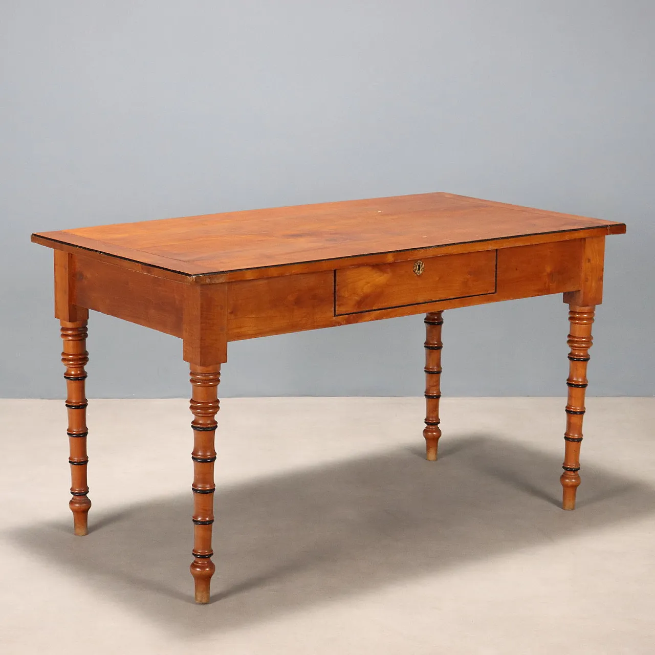 Cherry and fir table with ebonized moldings, mid-19th century 1