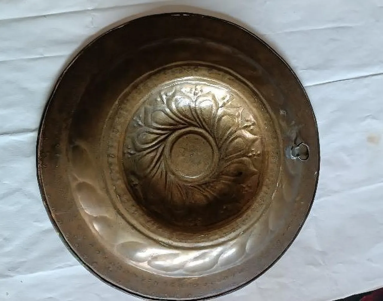 Embossed brass almoner plate, 17th century 8