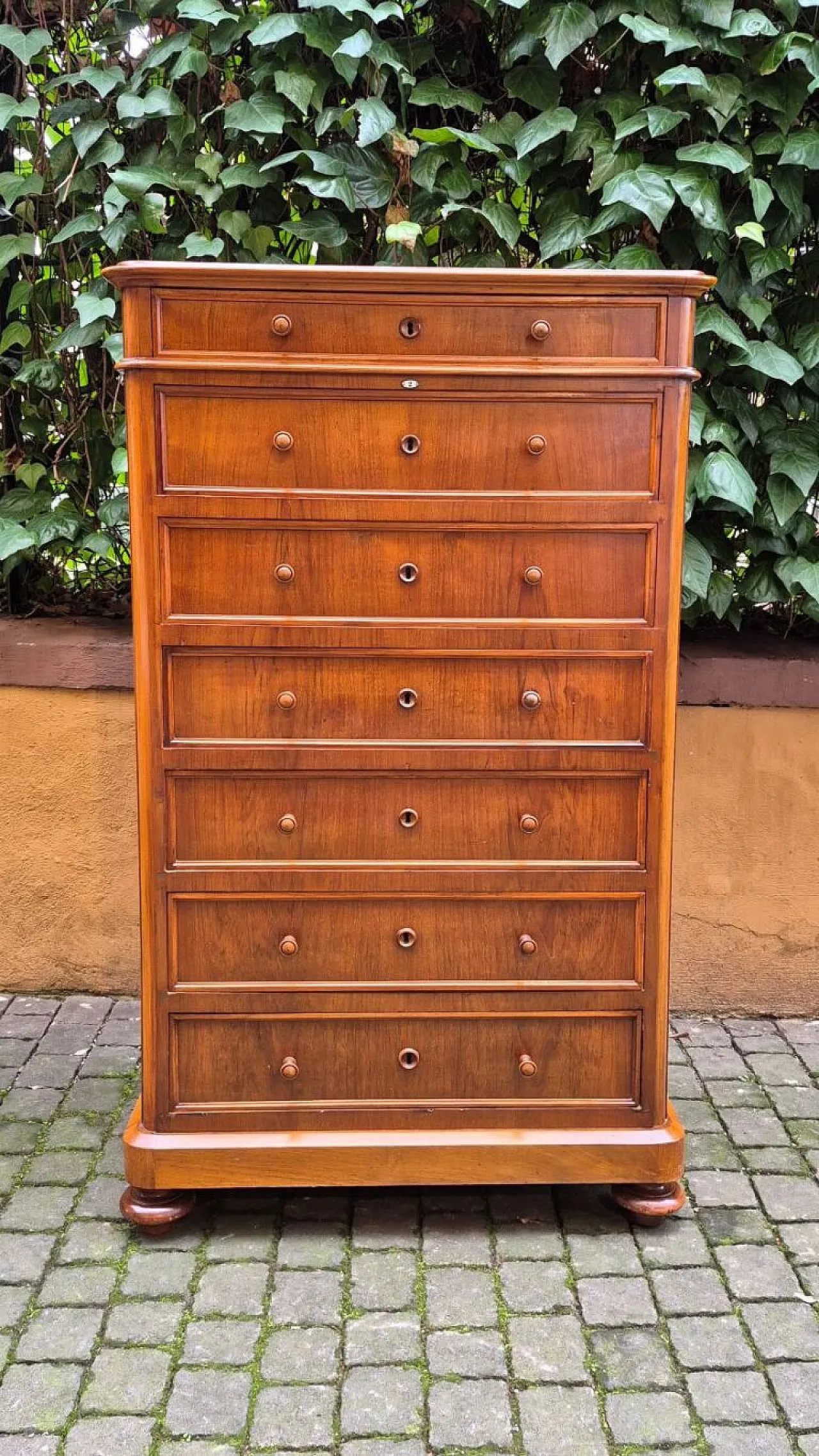 Pair of walnut-veneered weeklies, 19th century 1