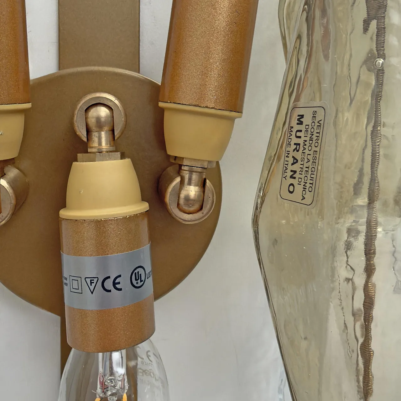 Pair of glass Poliedri sconces in amber and clear, 20th century 9