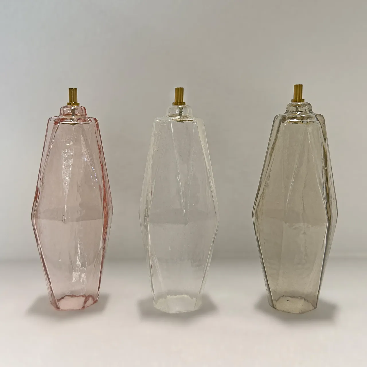 Pair of glass Poliedri sconces in amber and clear, 20th century 10