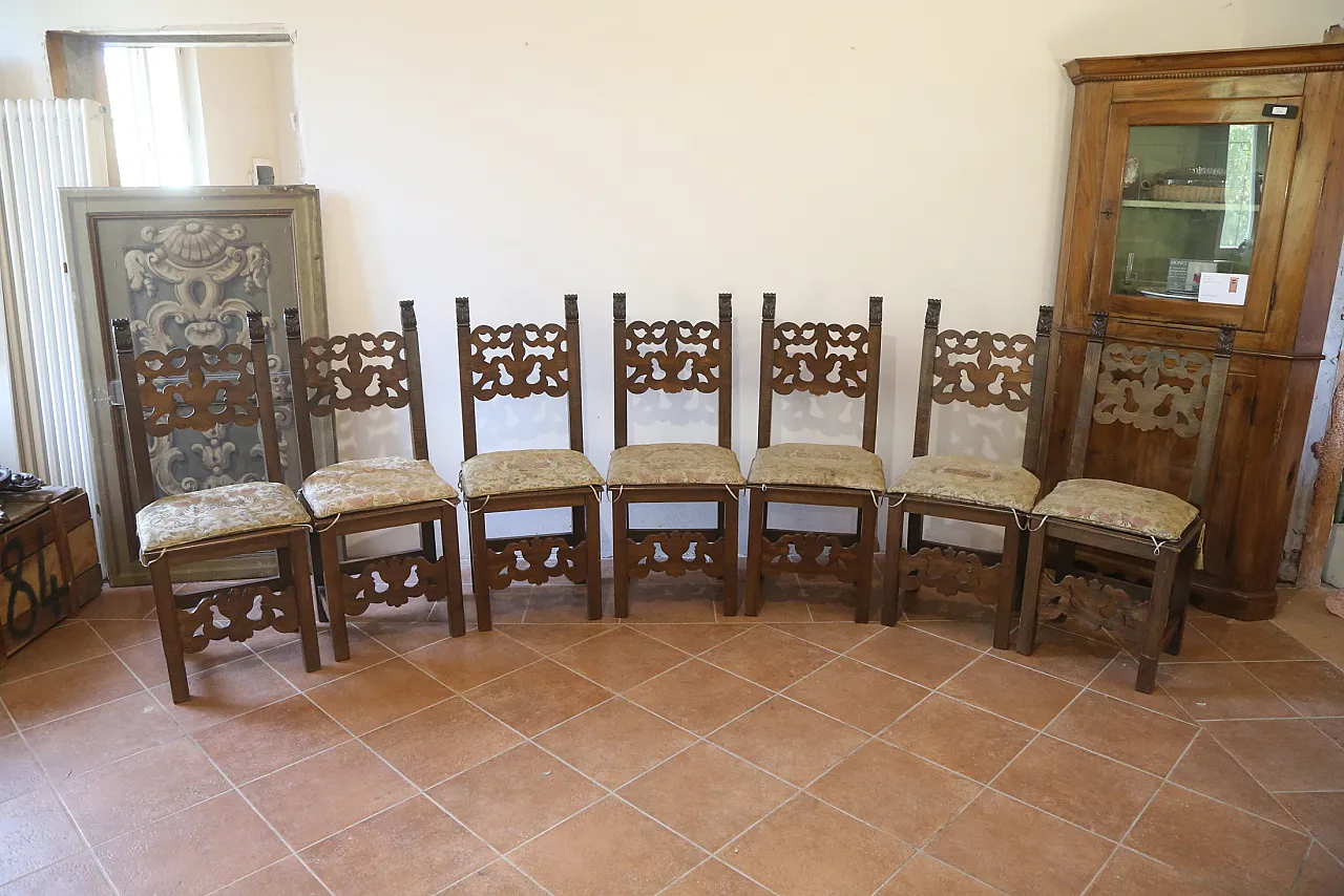 7 Neo-Renaissance chairs in solid walnut wood, 1940s 1