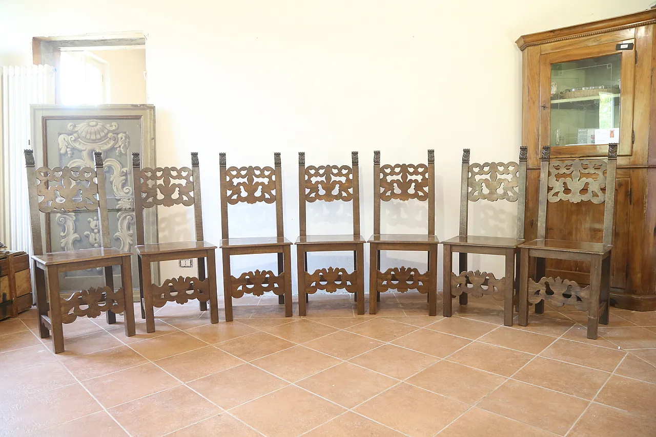 7 Neo-Renaissance chairs in solid walnut wood, 1940s 8