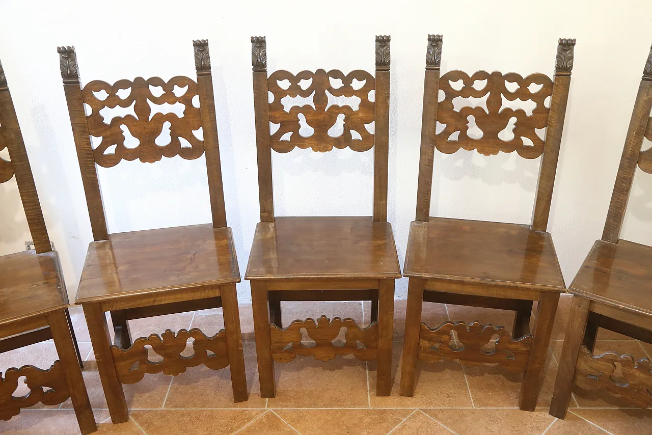 7 Neo-Renaissance chairs in solid walnut wood, 1940s 9