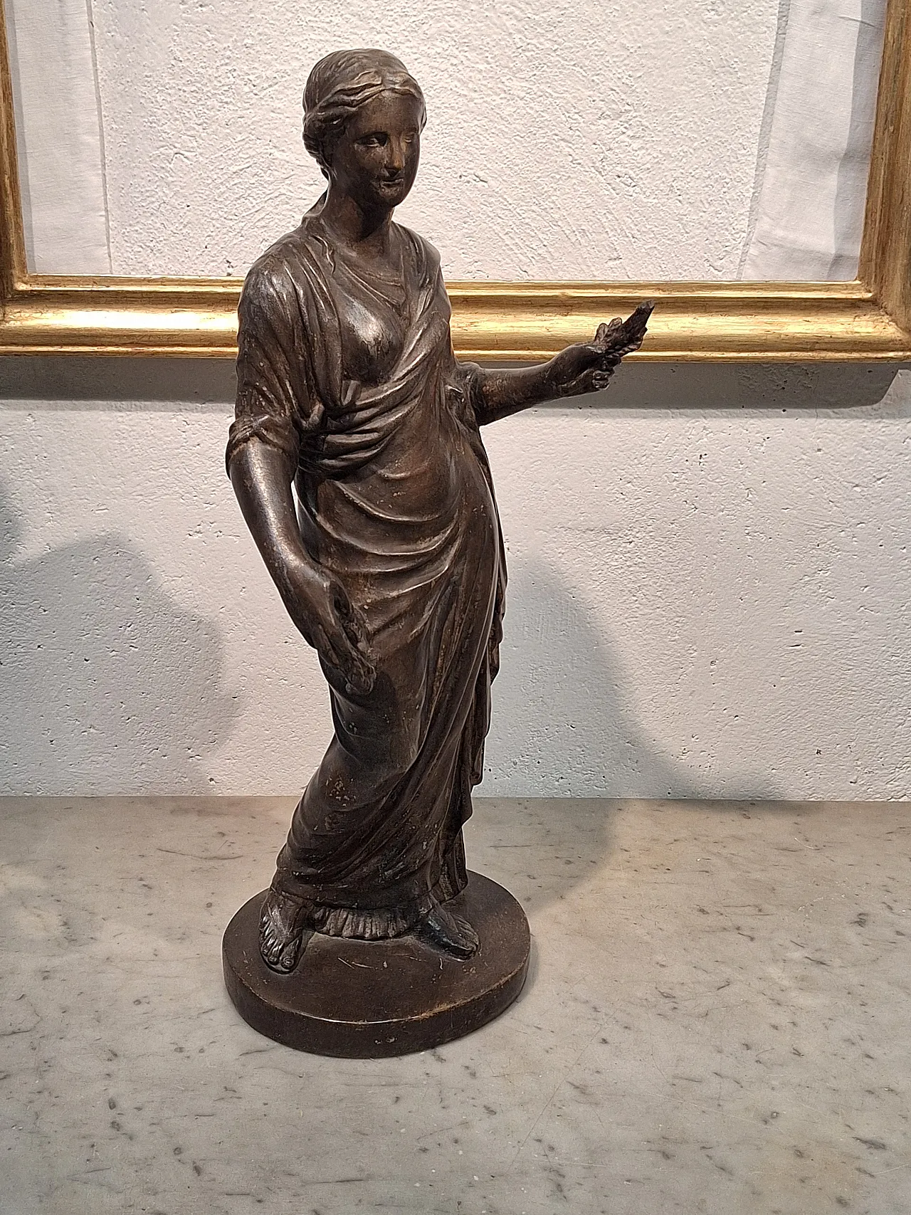 Statue depicting a dressed female figure, 20th century 12