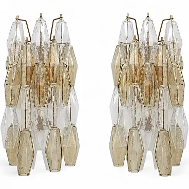 Pair of glass Poliedri sconces in amber and clear, 20th century