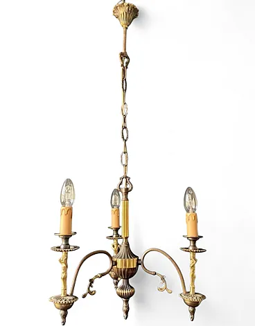 Brass chandelier with bronze statuettes of cherubs, 20th century