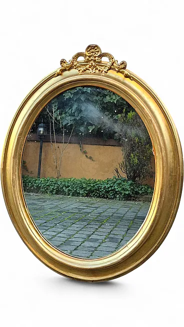 Specchiera ovale in legno dorato con cimasa, '800
